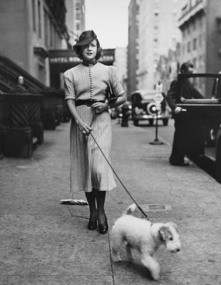 Wurts Bros. - [Woman walking a dog.], ca. 1935